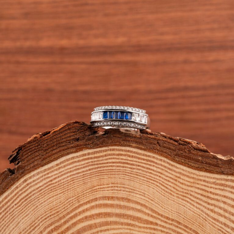 Band Style AD adjustable Ring with Blue Gem