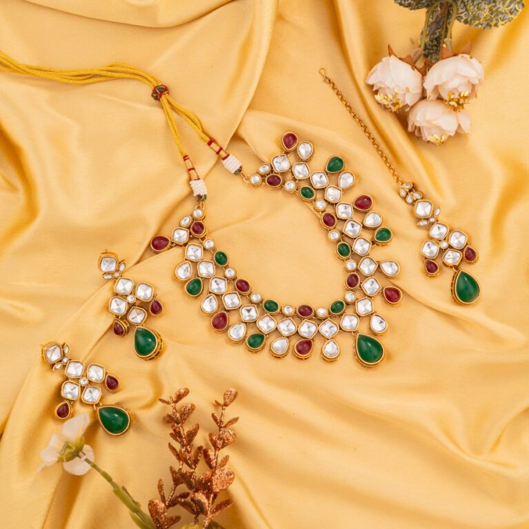 Red and Green Stones incised with Gold Kundan suits all occasions