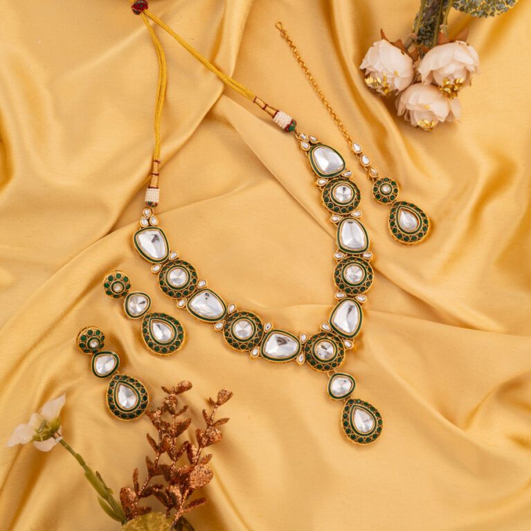 White Kundan with sober base and Gold Polish