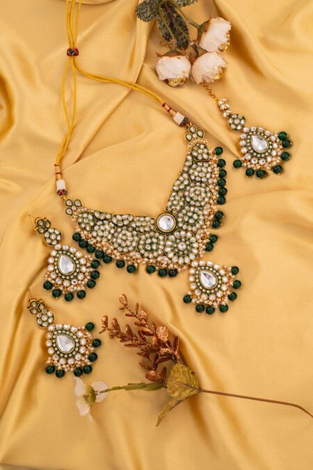 Green Pearls with Kundan set on Gold polish and Green Meena