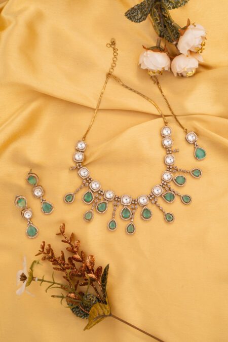 Hanging Aqua Blue Crystals On Gold Polish With perfectly crafted Kundan