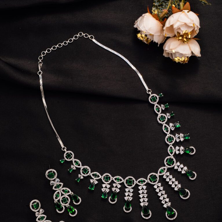 Green hanging crystals on White Gold AD string, gives sparkling looks on every occasion