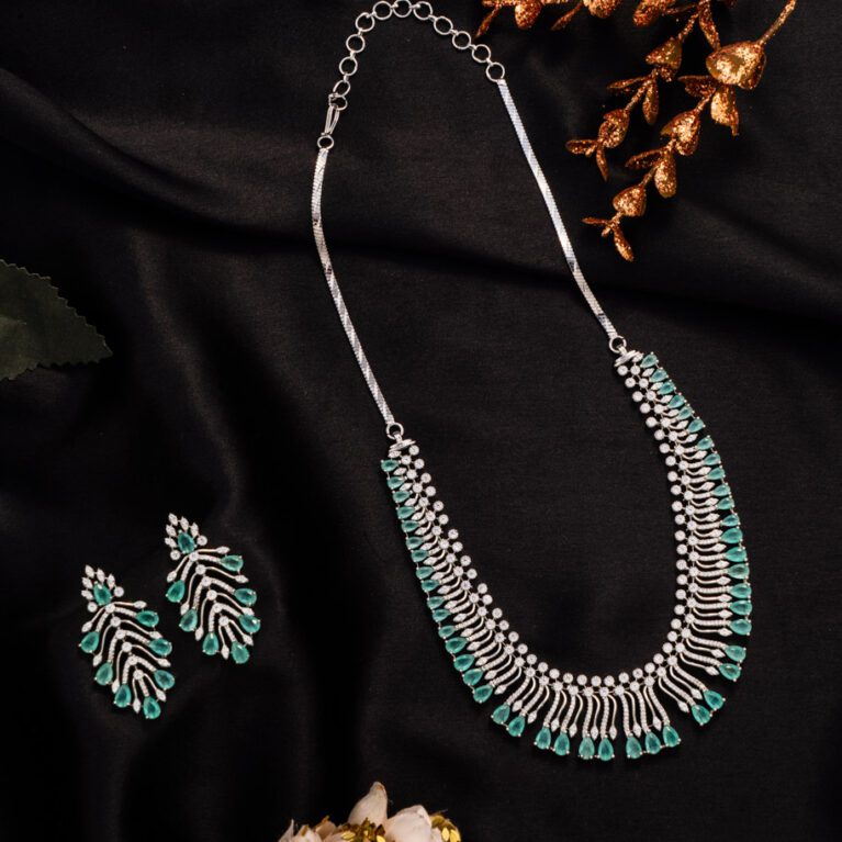 Timeless White Gold AD piece with Aqua blue Crystals to Embellish your attire