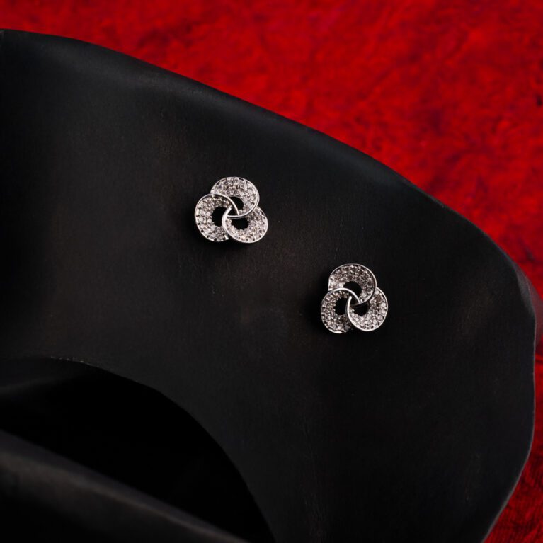 Triple round ring crossed design in white gold finish