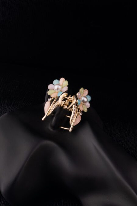 Multi Colored Pearl Flower embedded Golden Clutcher