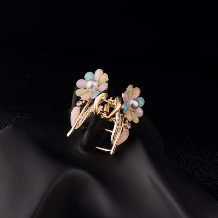 Multi Colored Pearl Flower embedded Golden Clutcher