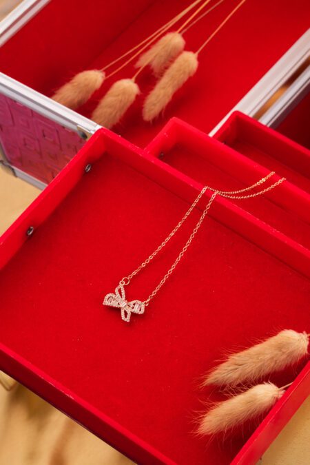 Bow Designed AD Necklace on Gold Chain